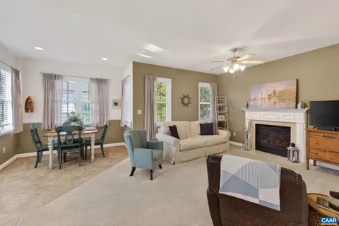 a view of a dining room with furniture and window