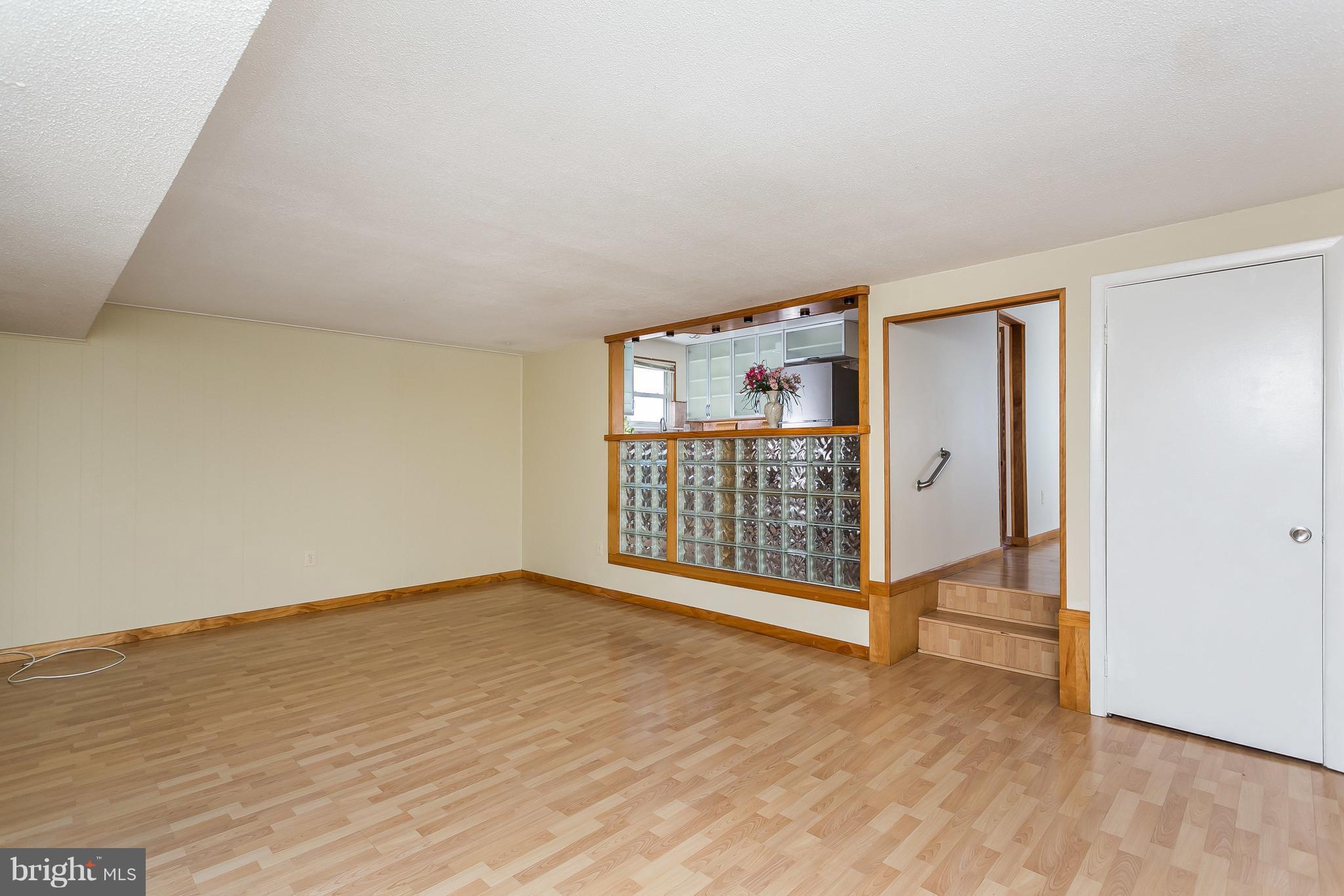 4812 Galley Road Baltimore, MD 21236 - Photo 17 of 30 wooden floor in an empty room with a window