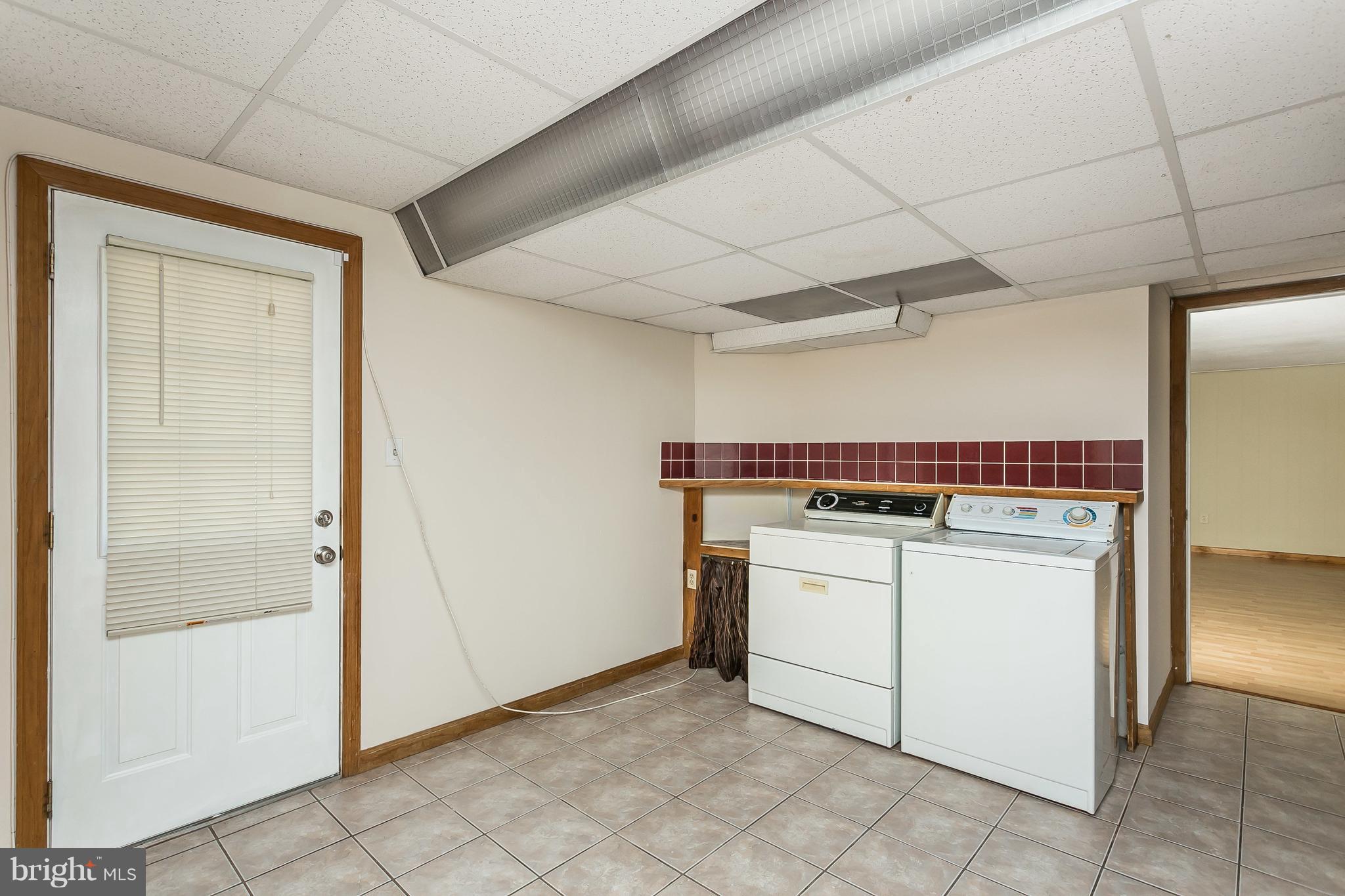 4812 Galley Road Baltimore, MD 21236 - Photo 20 of 30 a utility room with dryer and washer
