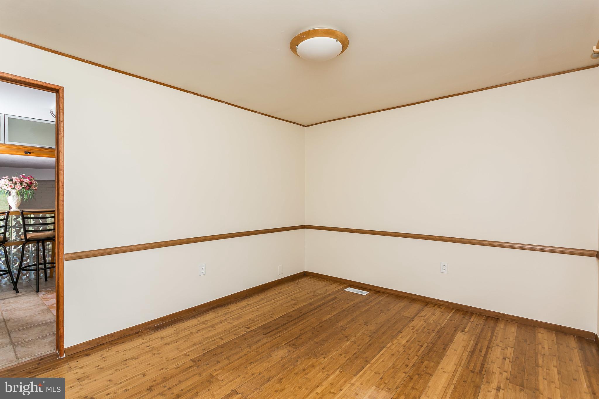 4812 Galley Road Baltimore, MD 21236 - Photo 9 of 30 a view of a room with wooden floor