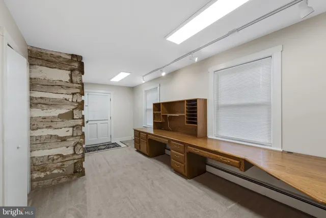 a view of room with flat screen tv