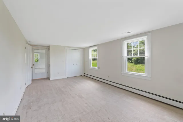 an empty room with windows