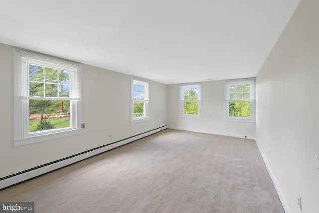 an empty room with windows