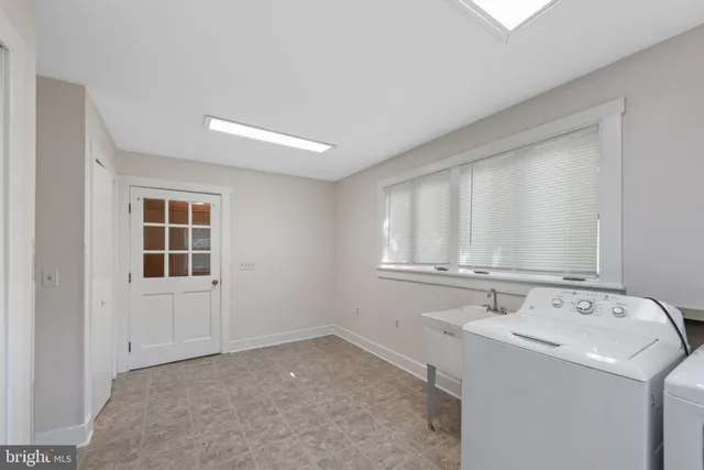 a view of a garage with parked cars