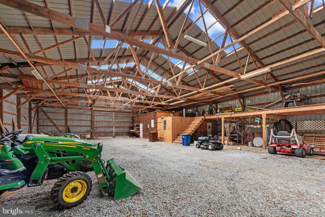 a view of a garage with a car parked