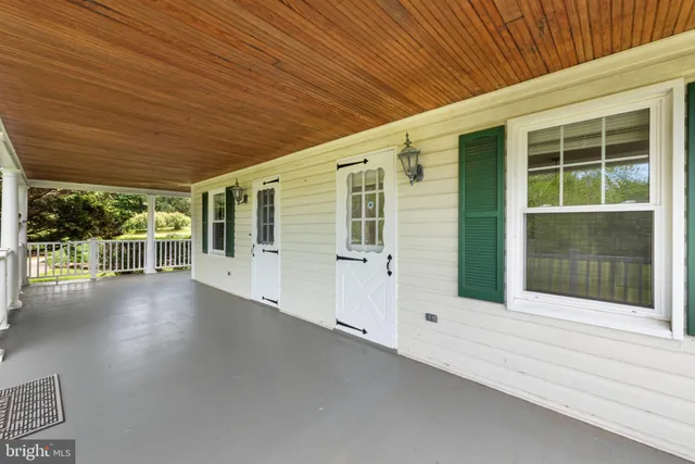 a view of front door and deck