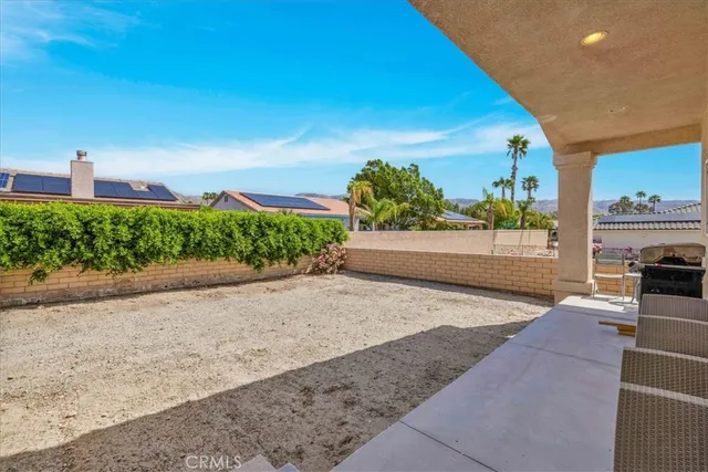 a view of a back yard of the house