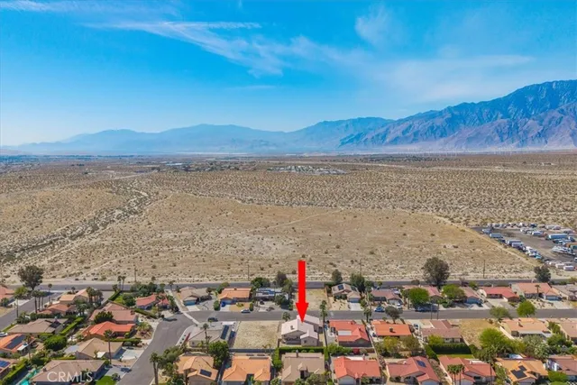 a view of an ocean and a mountain