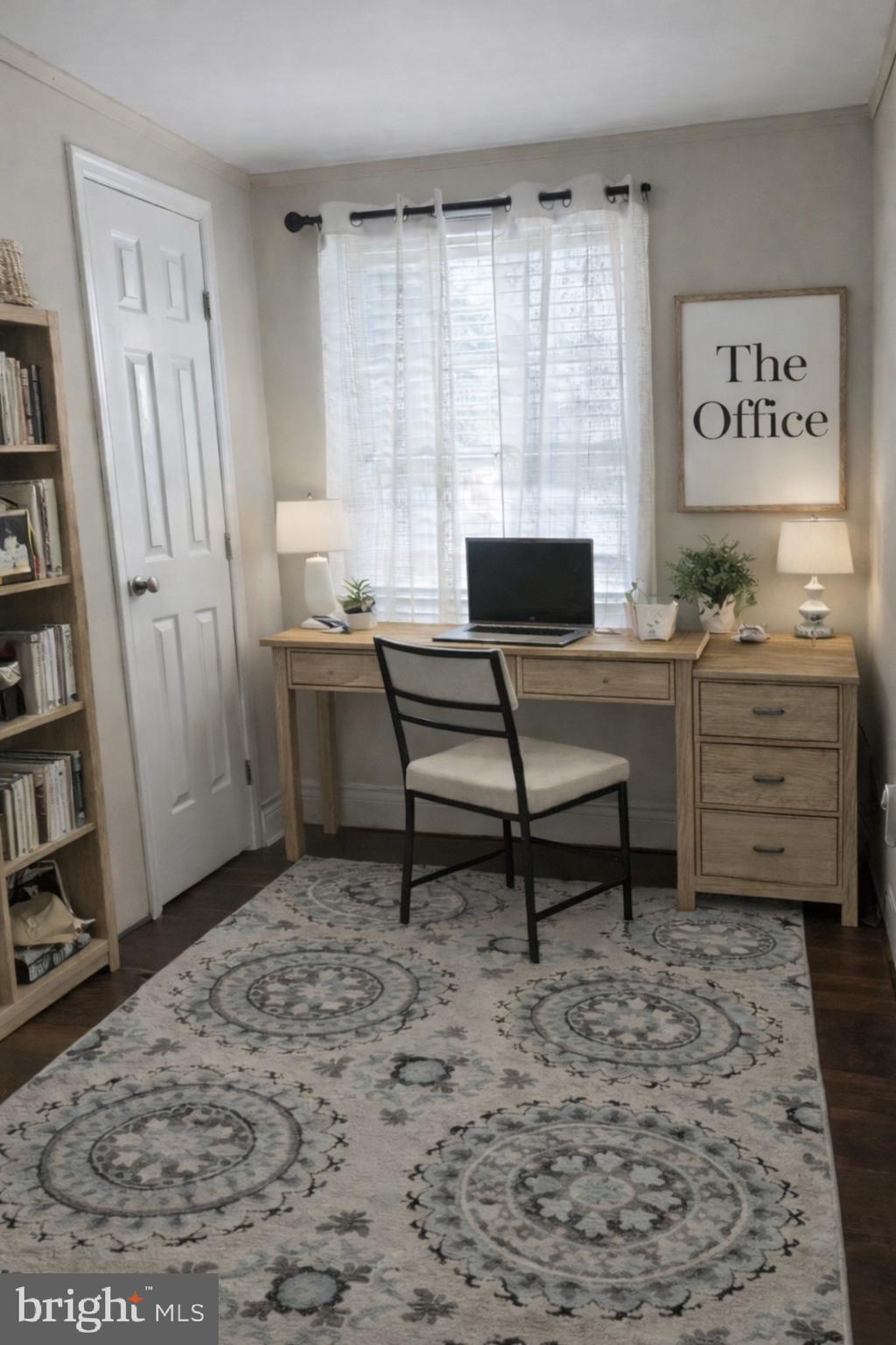 92 McCarty Road Fredericksburg, VA 22405 - Photo 22 of 39 a view of a workspace with furniture and a window