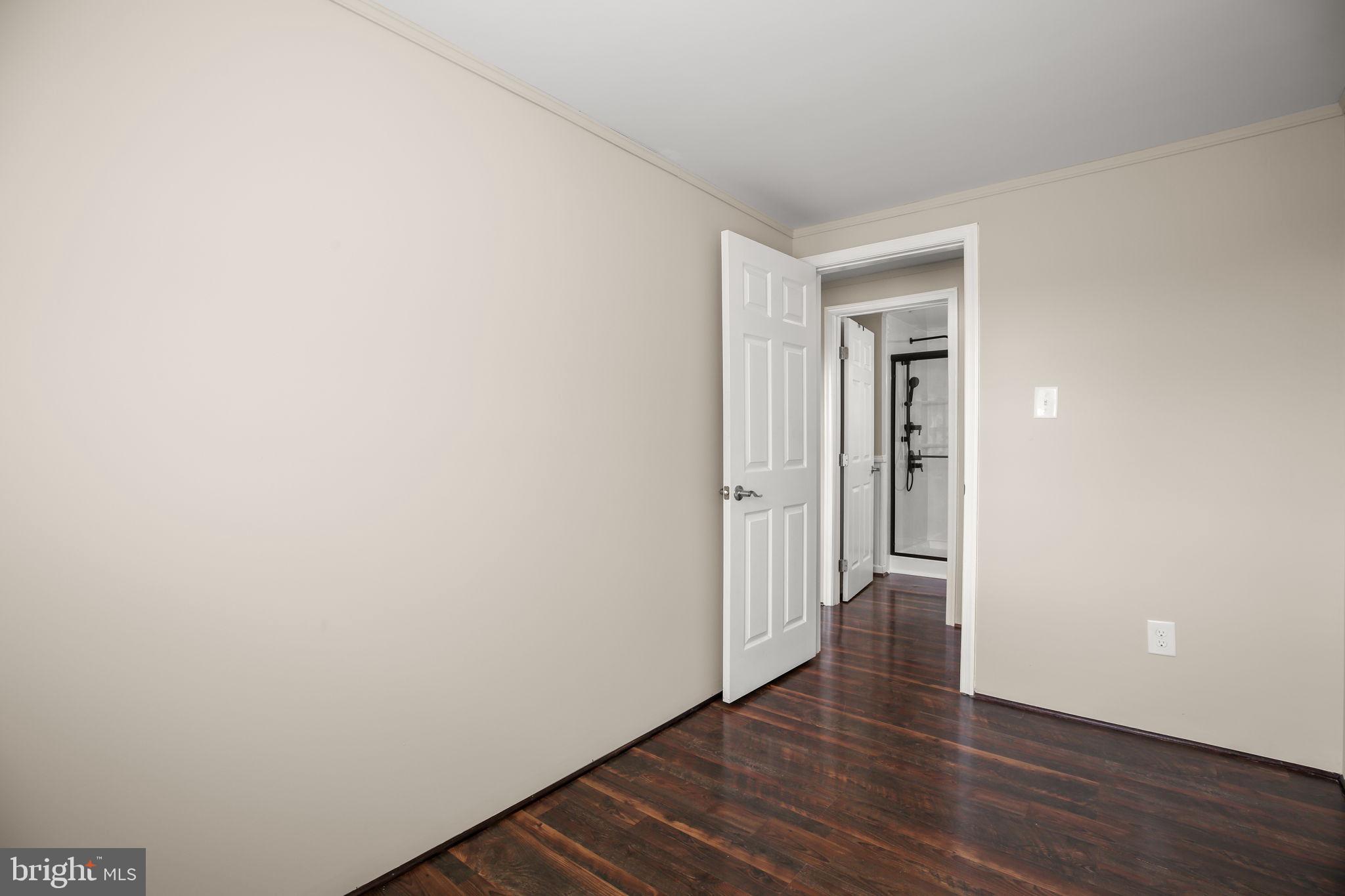 92 McCarty Road Fredericksburg, VA 22405 - Photo 23 of 39 a view of an empty room and wooden floor