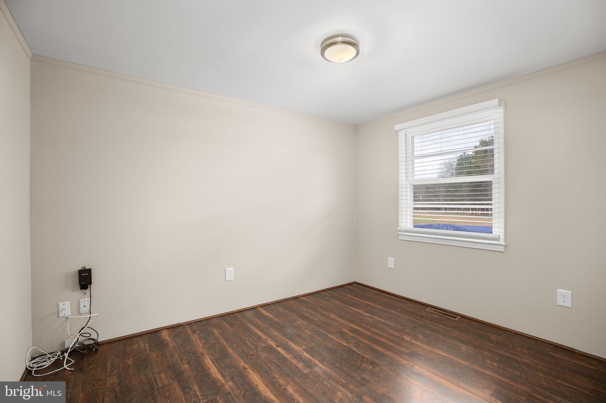92 McCarty Road Fredericksburg, VA 22405 - Photo 24 of 39 an empty room with a window