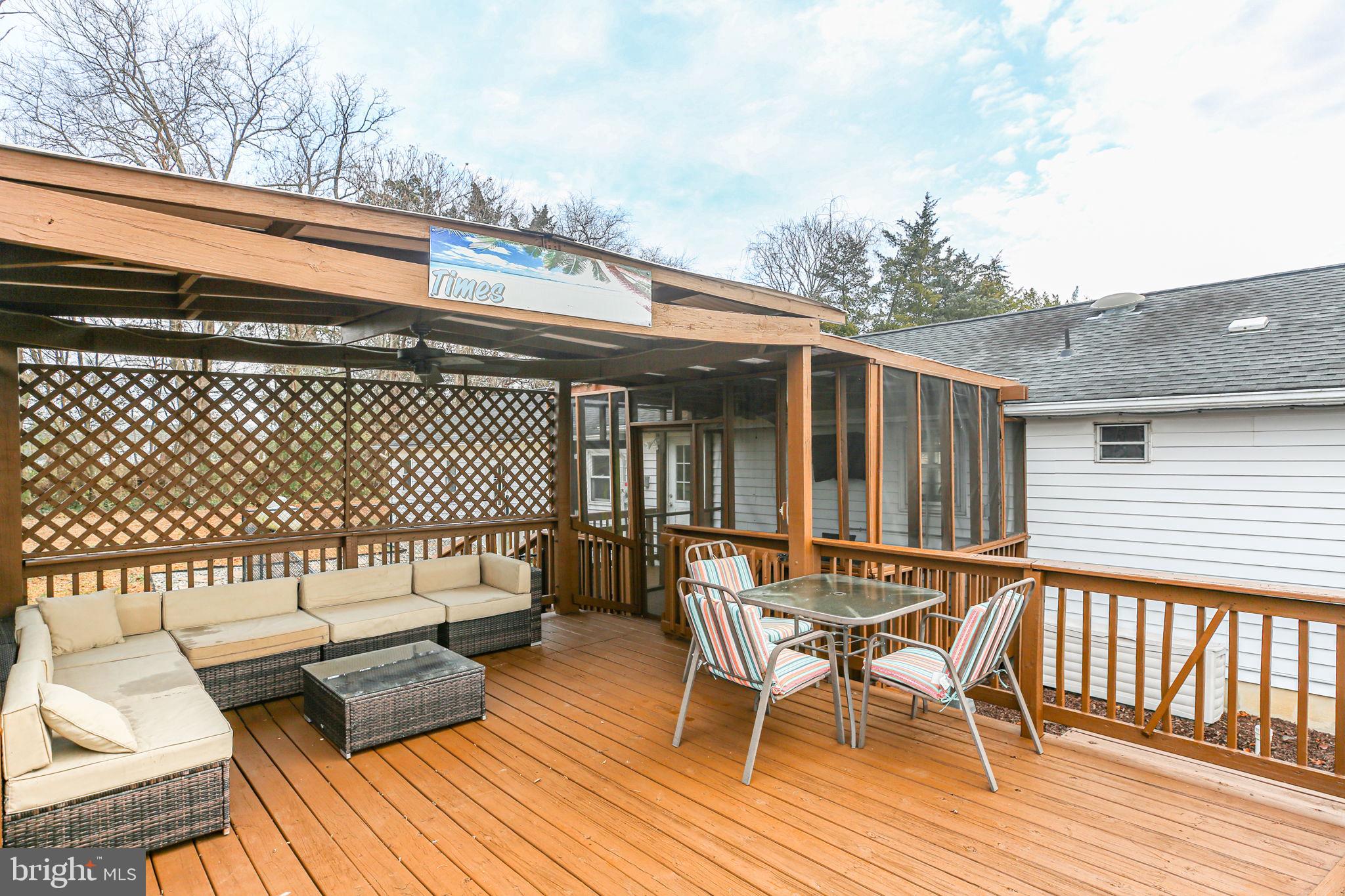 92 McCarty Road Fredericksburg, VA 22405 - Photo 24 of 31 a view of a chairs on the deck