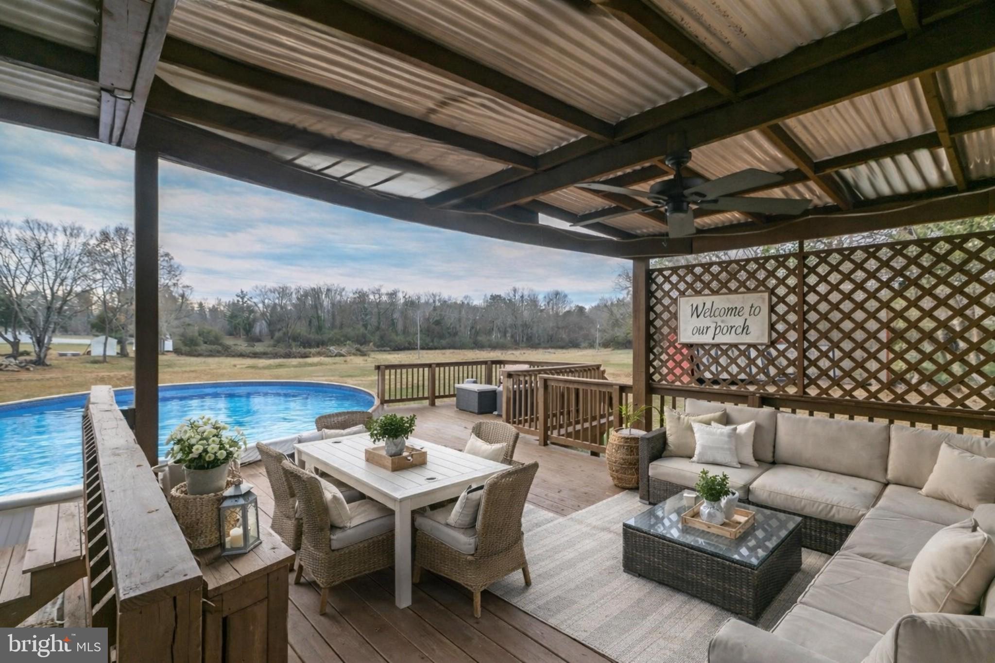 92 McCarty Road Fredericksburg, VA 22405 - Photo 31 of 39 a balcony with furniture and wooden floor