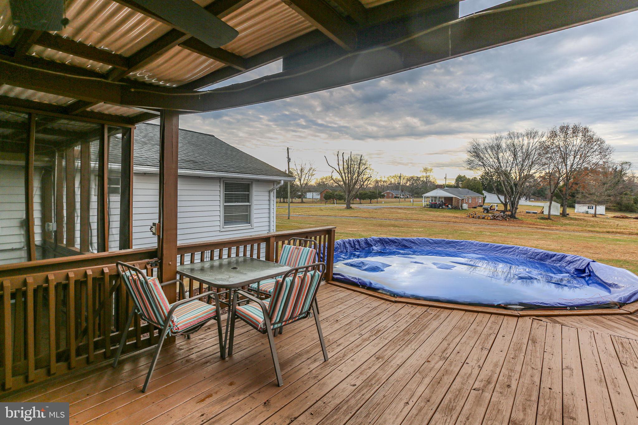 92 McCarty Road Fredericksburg, VA 22405 - Photo 34 of 39 a view of a chairs and table on the wooden floor