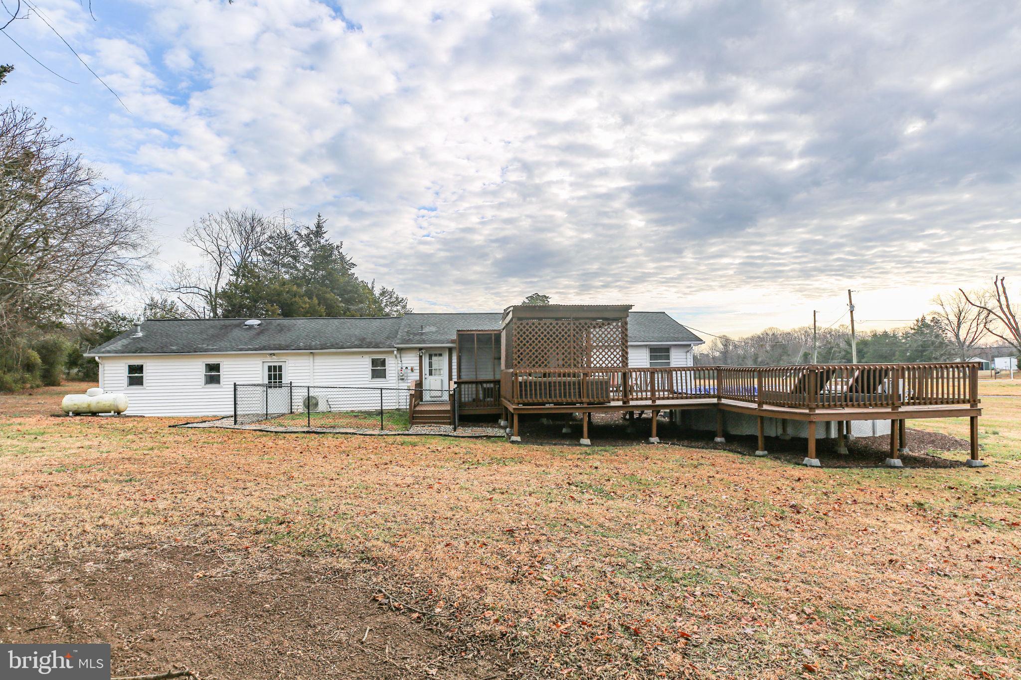 92 McCarty Road Fredericksburg, VA 22405 - Photo 38 of 39 a backyard of a house with yard and barbeque oven
