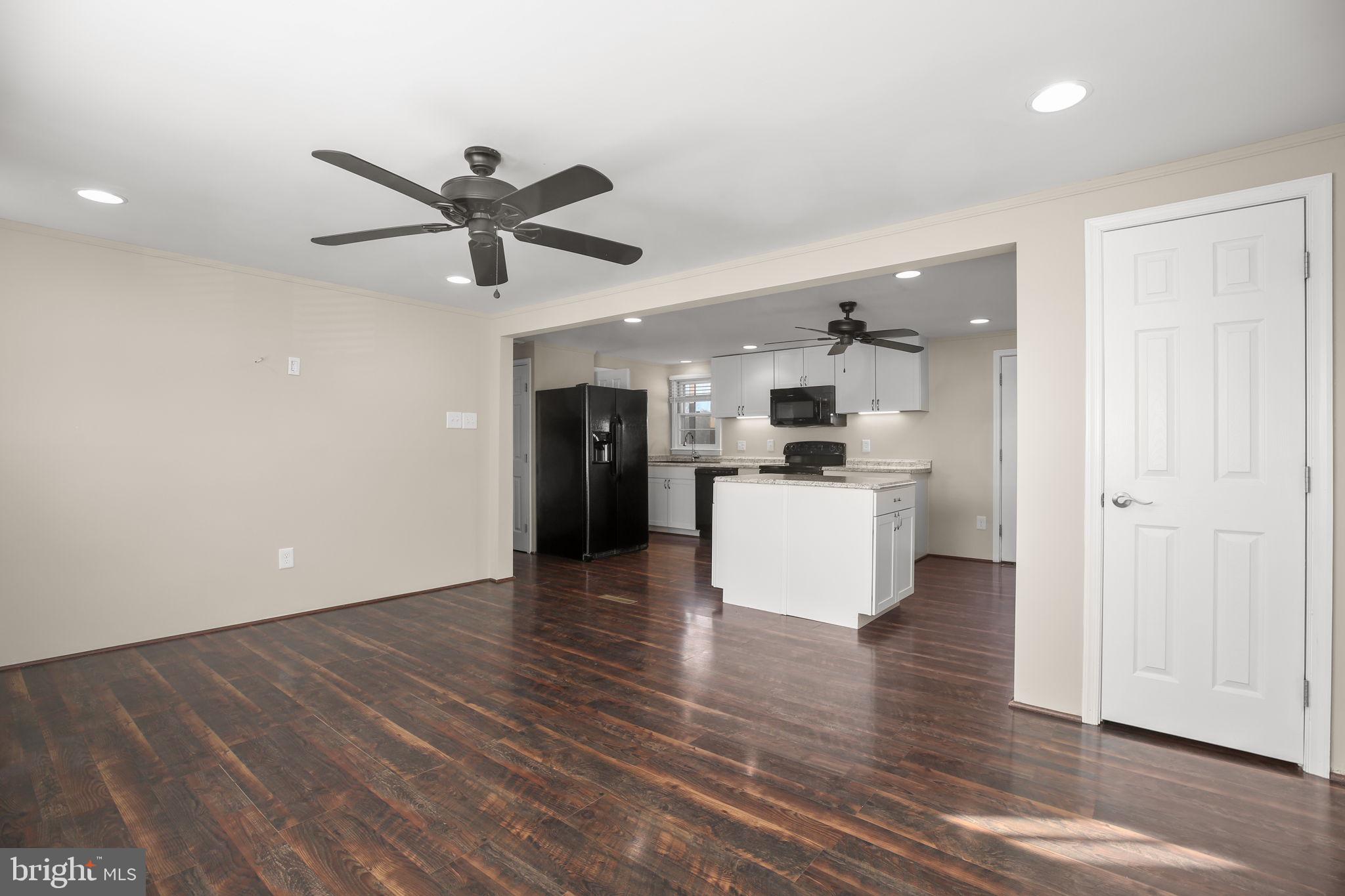 92 McCarty Road Fredericksburg, VA 22405 - Photo 5 of 39 a view of a kitchen with a sink and a refrigerator