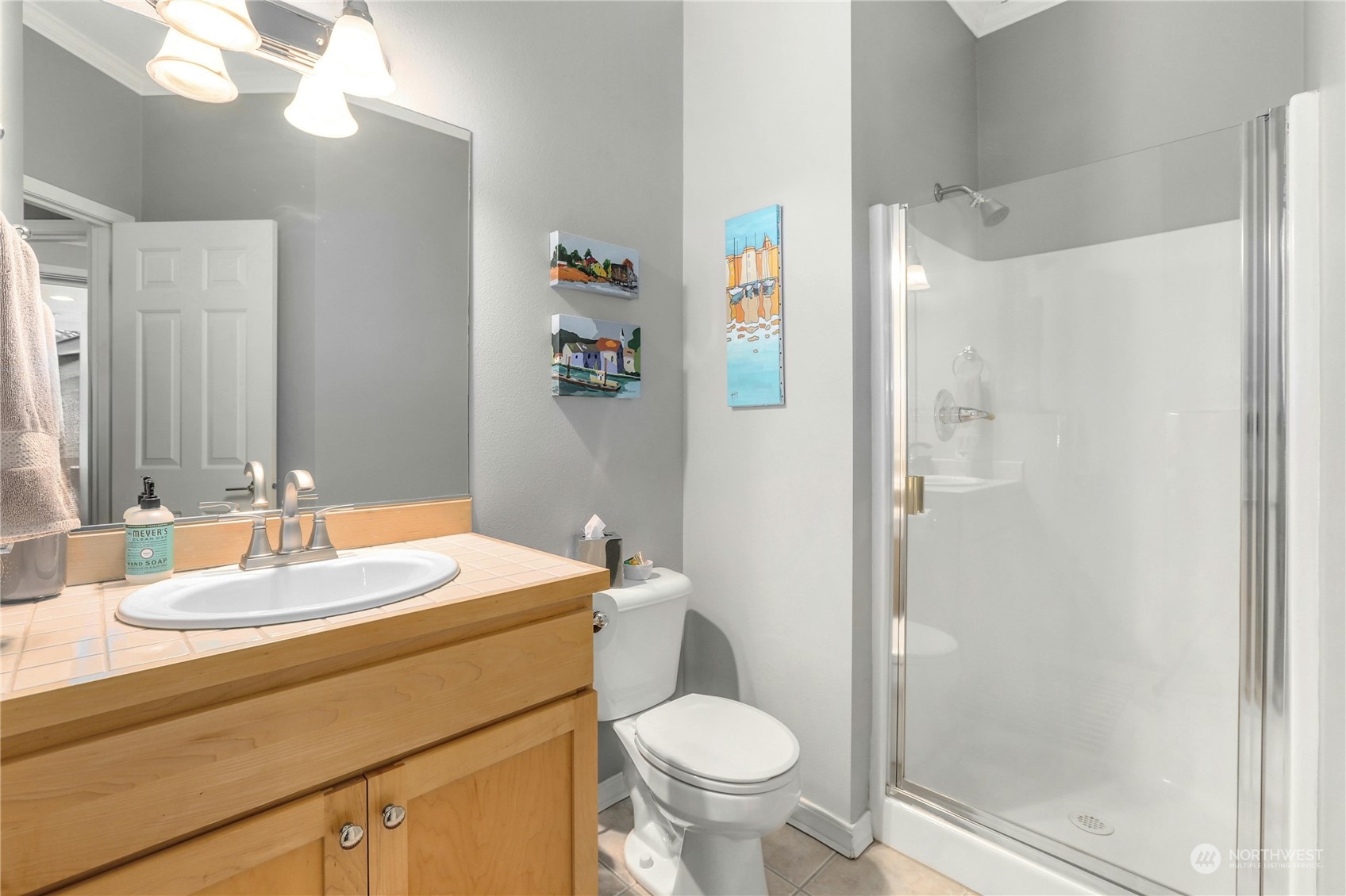 17309 106th Place Northeast Bothell, WA 98011 - Photo 17 of 39 a bathroom with a sink toilet and shower