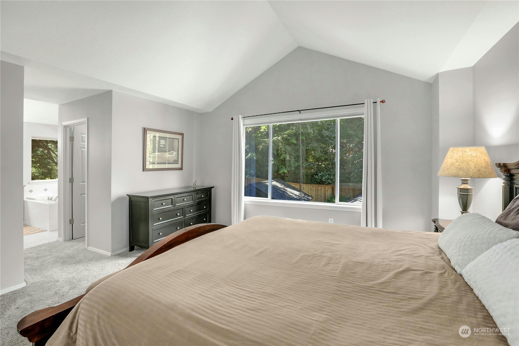 17309 106th Place Northeast Bothell, WA 98011 - Photo 20 of 39 a bedroom with a bed and a window