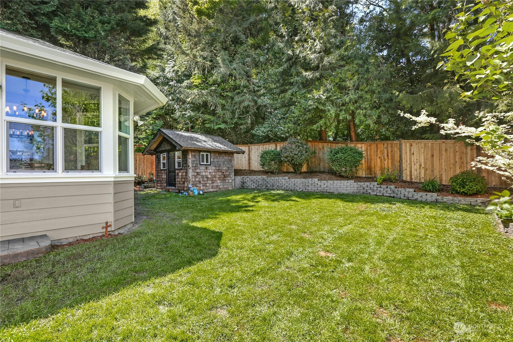 17309 106th Place Northeast Bothell, WA 98011 - Photo 32 of 39 a view of a house with a yard