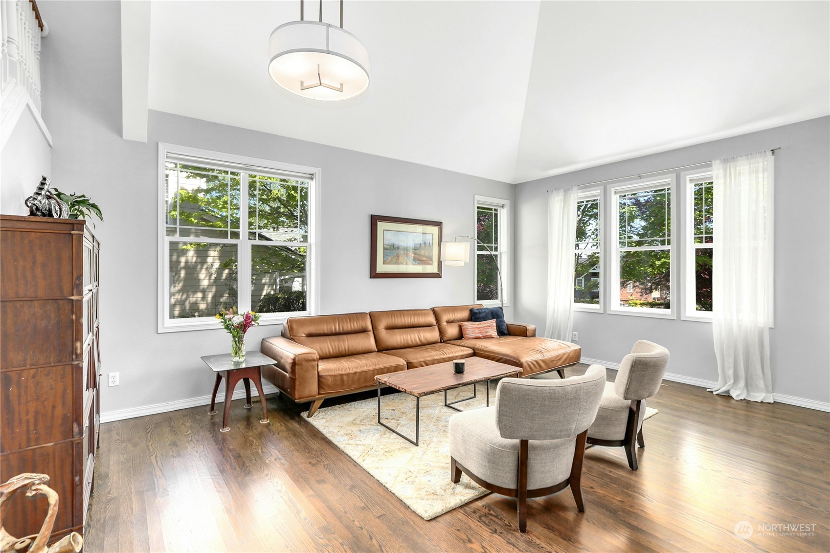 17309 106th Place Northeast Bothell, WA 98011 - Photo 7 of 39 a living room with furniture and wooden floor