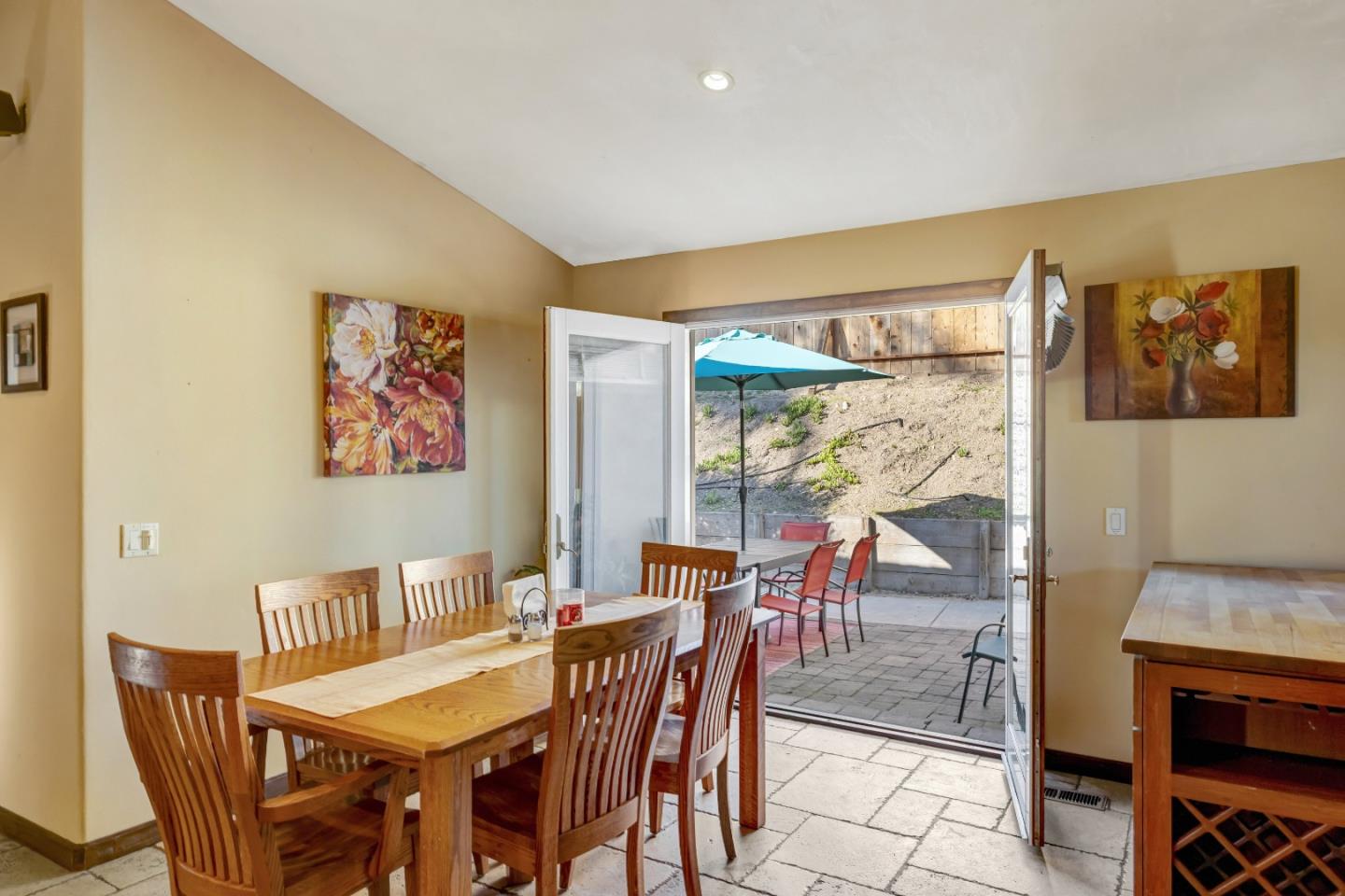 810 Altura Place Del Rey Oaks, CA 93940 - Photo 14 of 57 a view of a dining room with furniture a rug and wooden floor