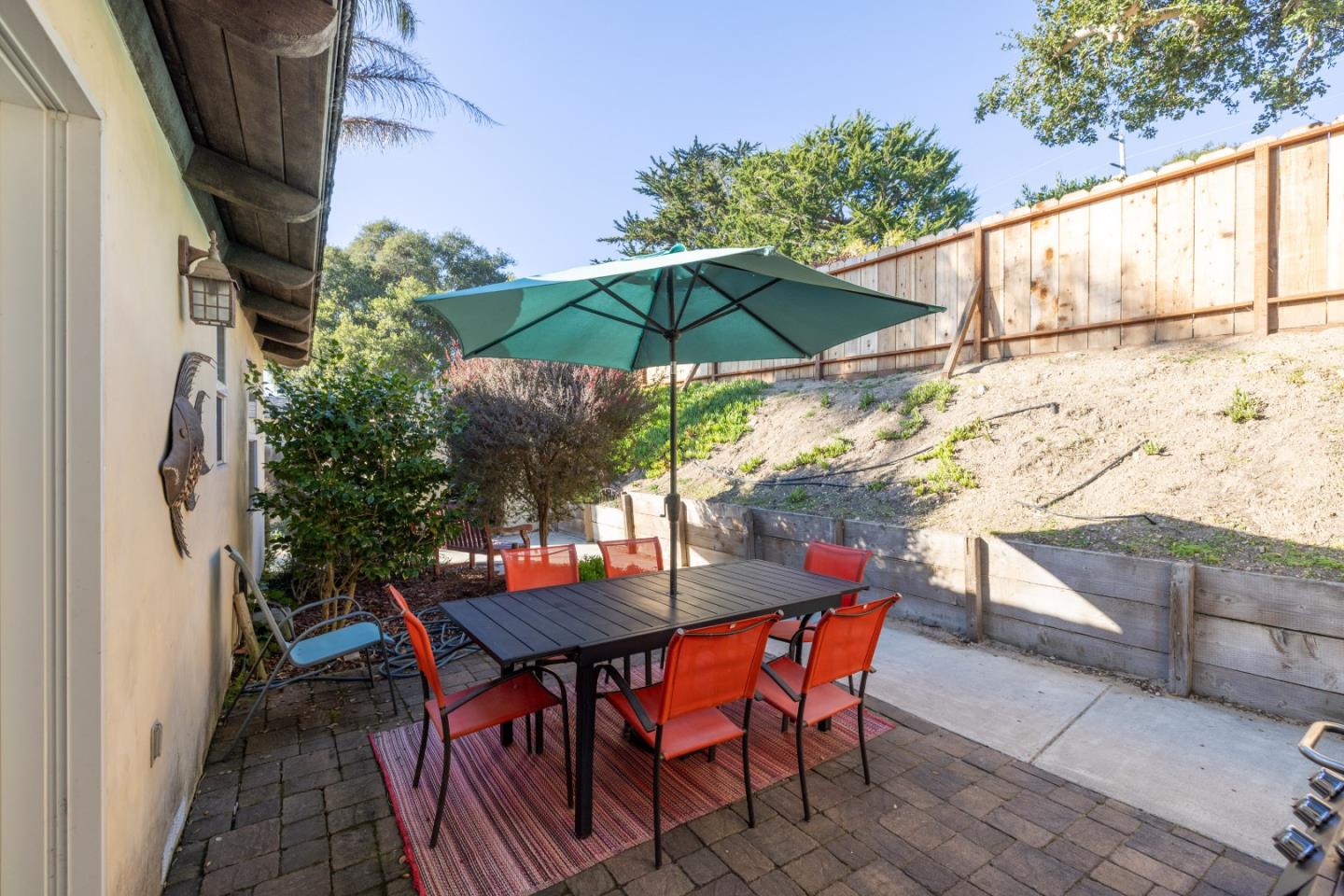 810 Altura Place Del Rey Oaks, CA 93940 - Photo 42 of 57 an outdoor space with furniture and umbrella