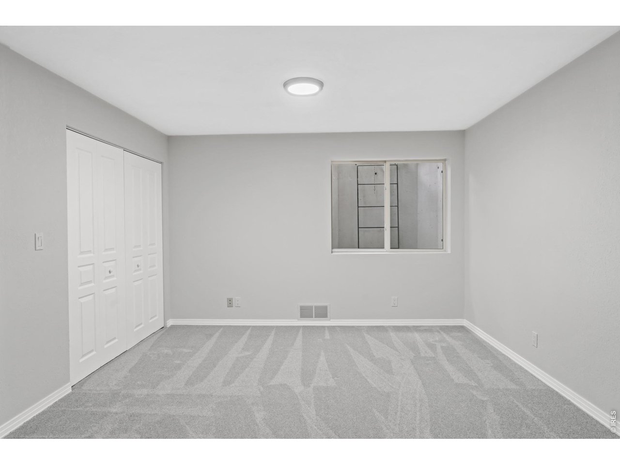 926 Hover Ridge Circle Longmont, CO 80501 - Photo 22 of 31 Basement bedroom/rec room