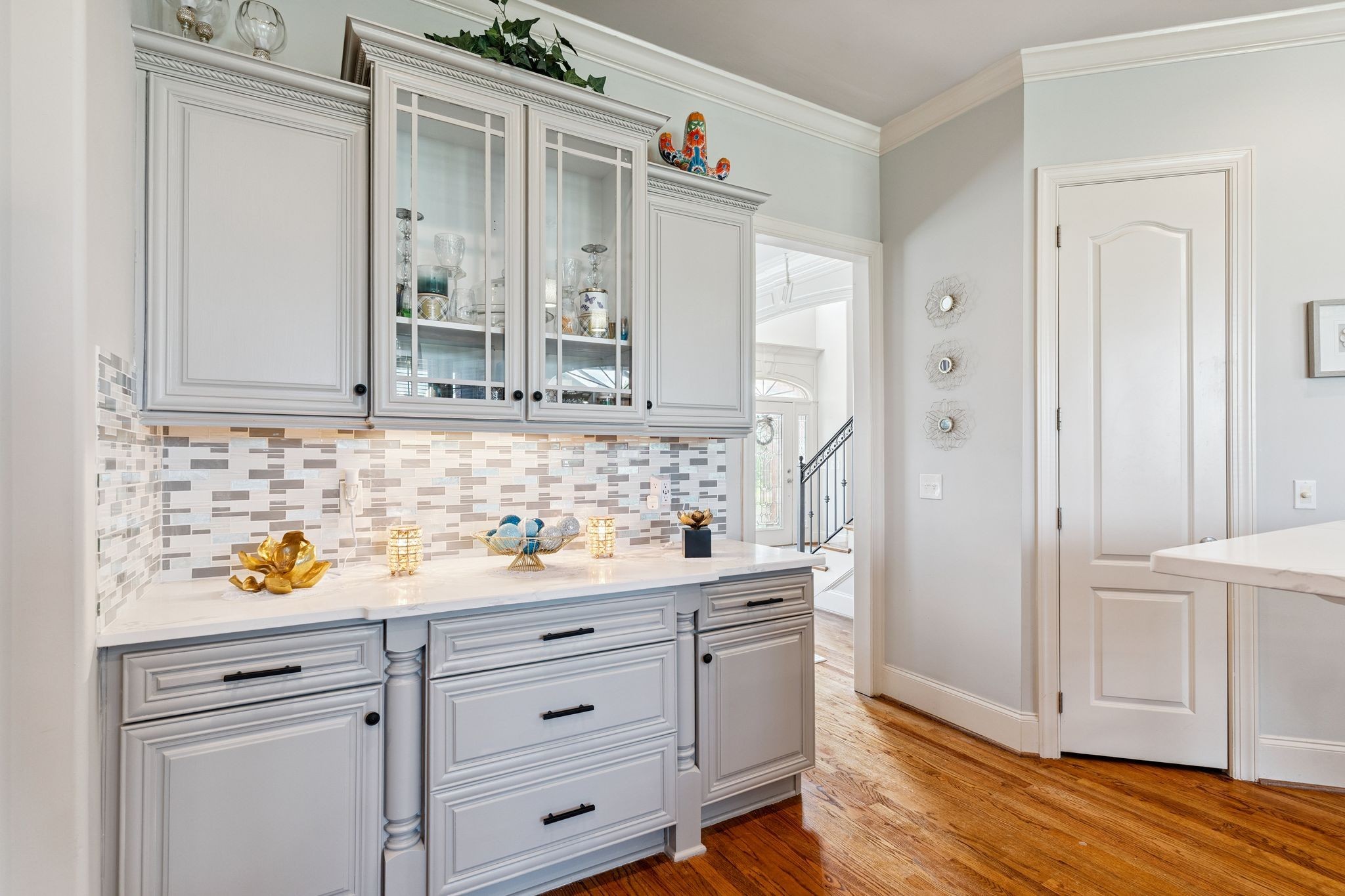 815 Stonebrook Drive Lebanon, TN 37087 - Photo 21 of 71 a view of cabinets a wooden floor and a window in the kitchen