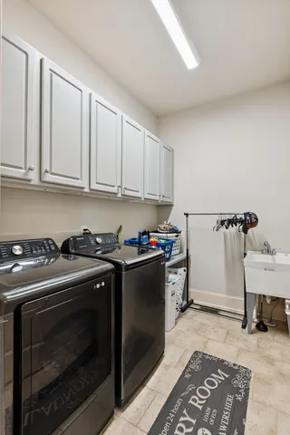 a bathroom with a sink a mirror and a shower