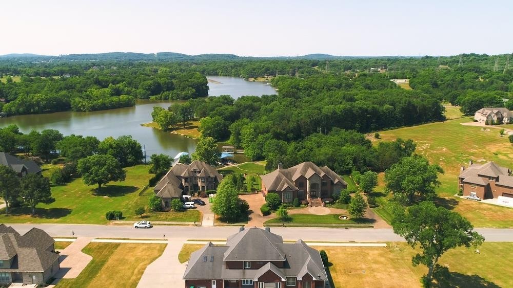 815 Stonebrook Drive Lebanon, TN 37087 - Photo 3 of 71 an aerial view of a house with pool lake view and mountain view