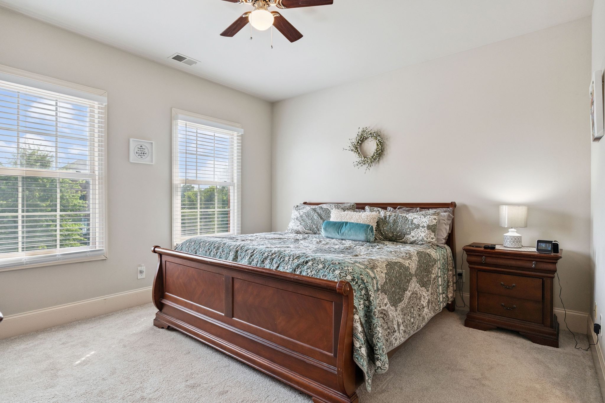 815 Stonebrook Drive Lebanon, TN 37087 - Photo 32 of 71 a bed sitting in a bedroom next to a window