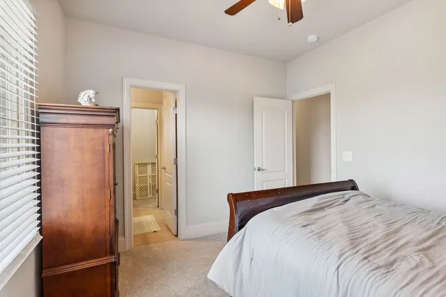 a bathroom with a shower and a toilet