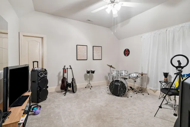 a front view of a house with a garden and porch