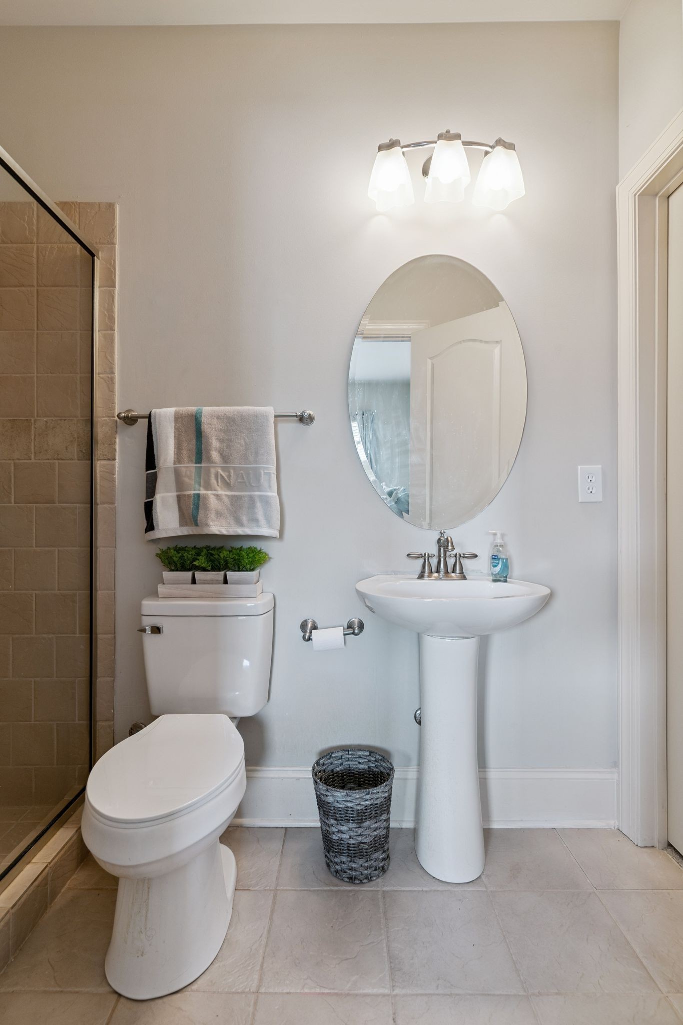 815 Stonebrook Drive Lebanon, TN 37087 - Photo 50 of 71 a bathroom with a toilet a sink and a mirror