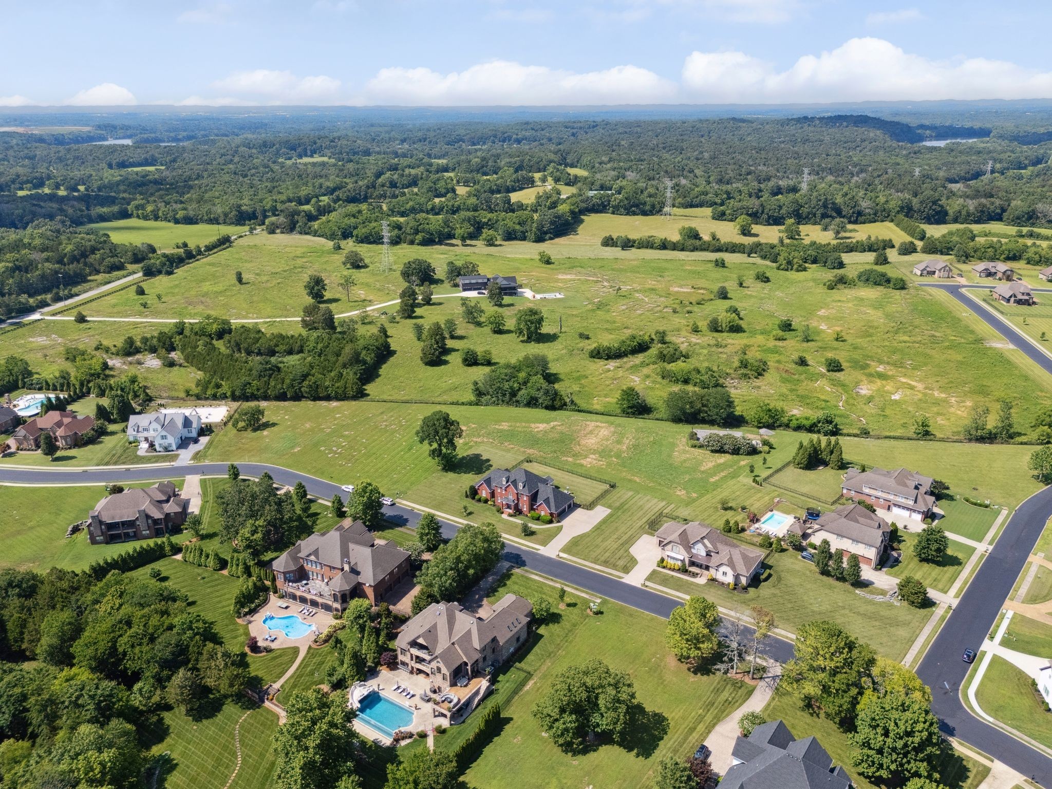 815 Stonebrook Drive Lebanon, TN 37087 - Photo 67 of 71 an aerial view of a city with lots of residential buildings ocean and mountain view in back