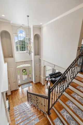 a living room with furniture a rug and a fireplace