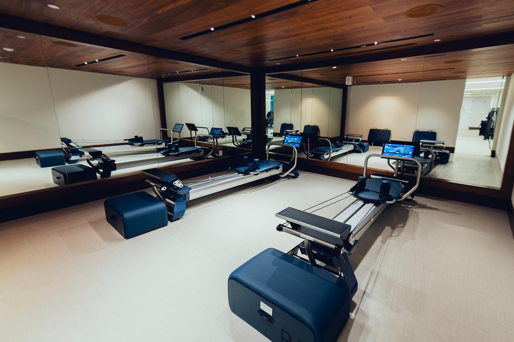 220 Southeast Mizner Boulevard, Unit PH907 Boca Raton, FL 33432 - Photo 26 of 29 a room with gym equipment and a large window