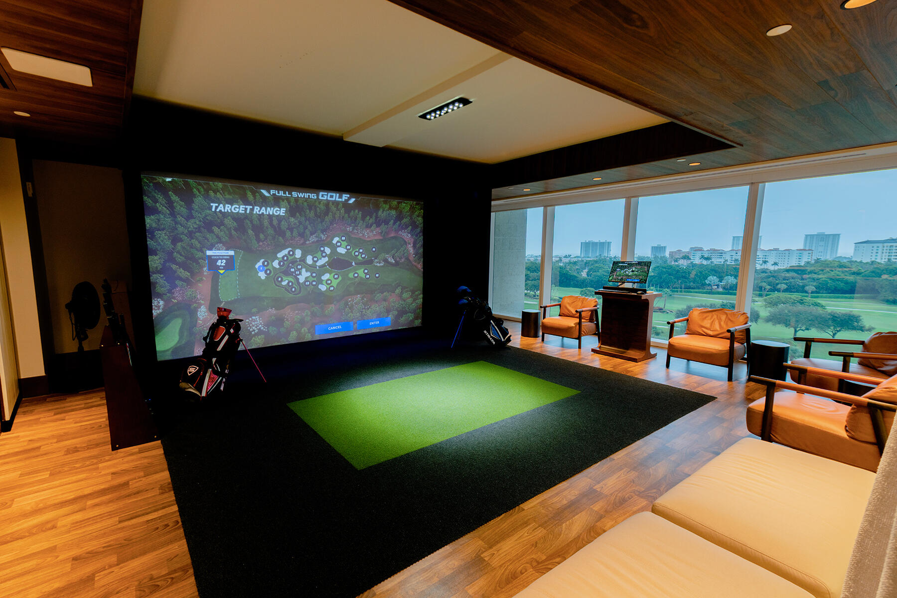 220 Southeast Mizner Boulevard, Unit PH907 Boca Raton, FL 33432 - Photo 27 of 29 a living room with flat screen tv