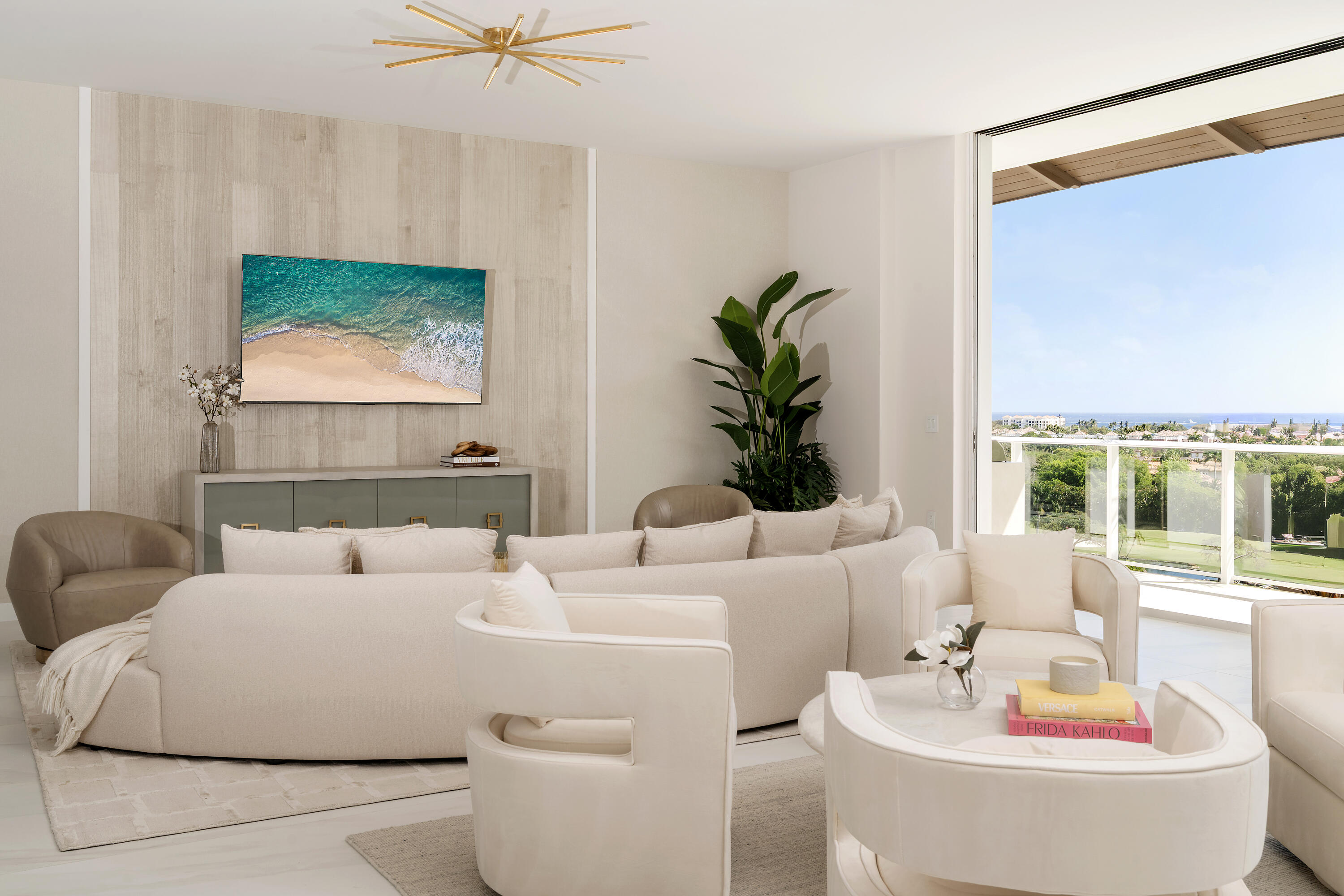 220 Southeast Mizner Boulevard, Unit PH907 Boca Raton, FL 33432 - Photo 3 of 29 a living room with furniture and a large window