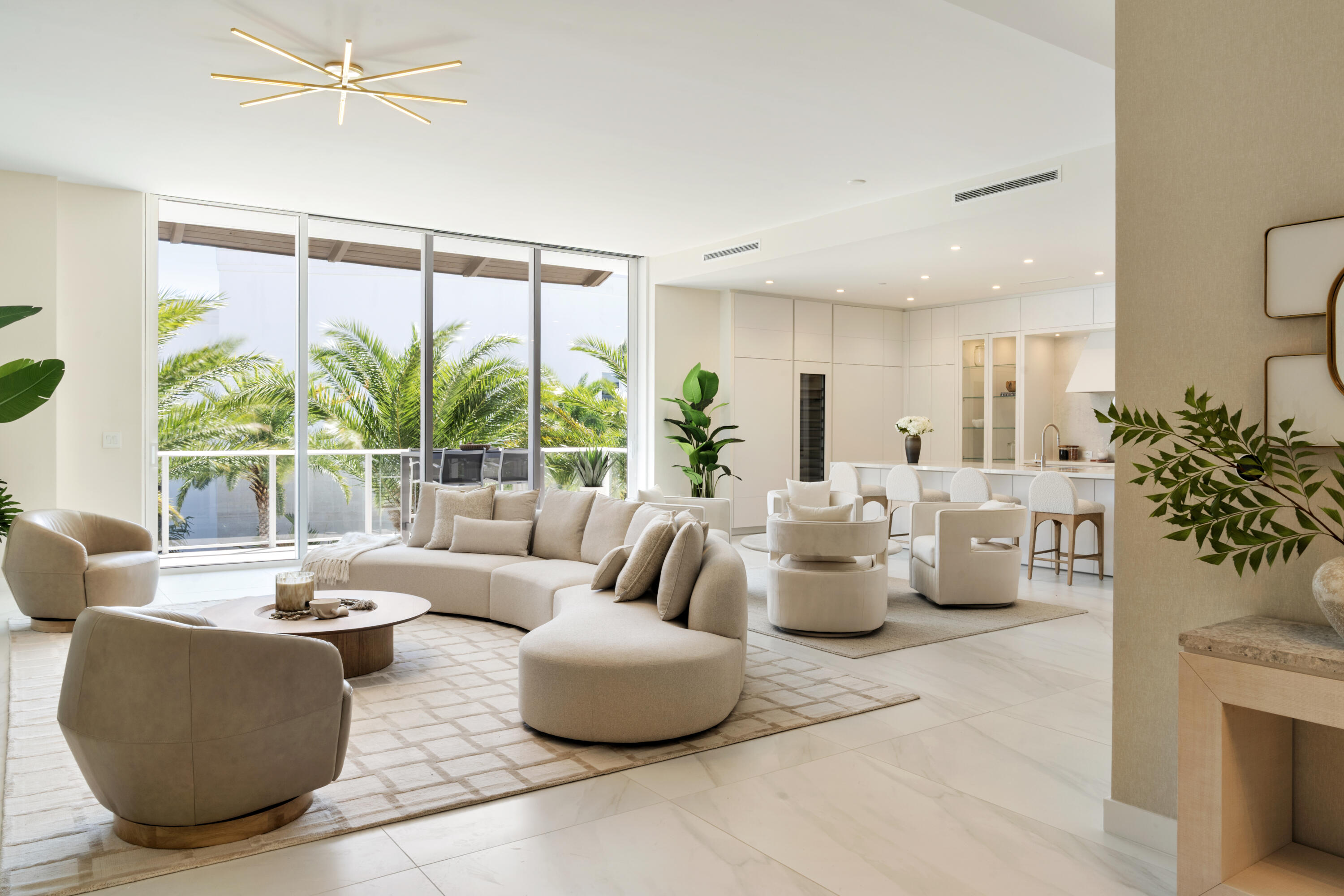 220 Southeast Mizner Boulevard, Unit PH907 Boca Raton, FL 33432 - Photo 4 of 29 a living room with furniture and a large window