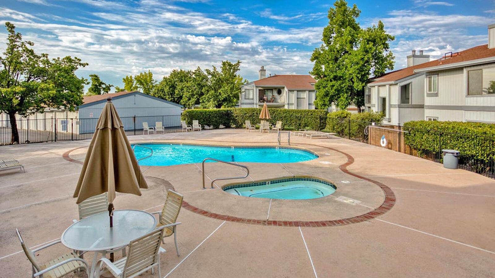 444 Ridgecrest Trail, Unit 119 Redding, CA 96003 - Photo 4 of 16 a view of a house with swimming pool and a yard