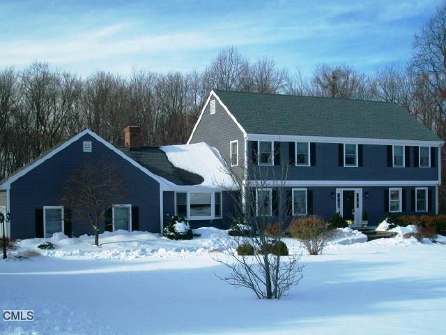 8 Harvest Common Road Newtown, CT 06482 - Photo 1 of 1 a front view of a house with a yard