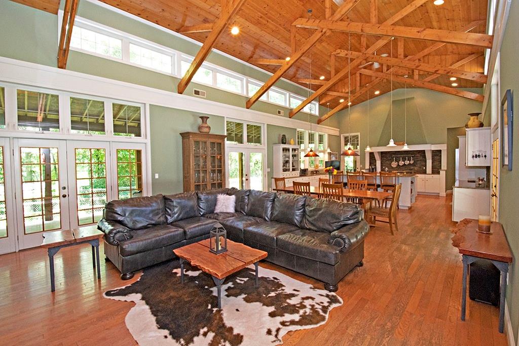 130 Lions Road Butler, PA 16001 - Photo 2 of 25 Great room with hardwood floors, architectural beams and abundant natural light.