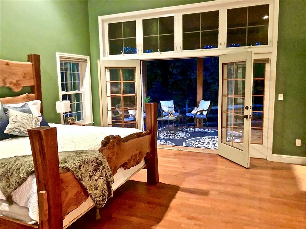 130 Lions Road Butler, PA 16001 - Photo 11 of 25 2nd set of french doors in master lead to covered sitting area on private rear porch overlooking the densely wooded property.