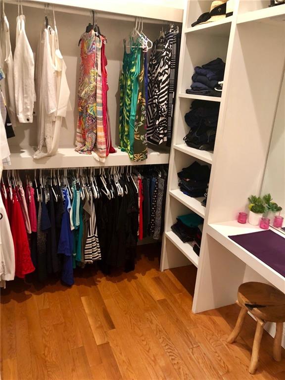 130 Lions Road Butler, PA 16001 - Photo 14 of 25 So many ways to stay organized in the large master closet with floor to ceiling shelving and a vanity area. Closet also has a built in ironing station for added convenience