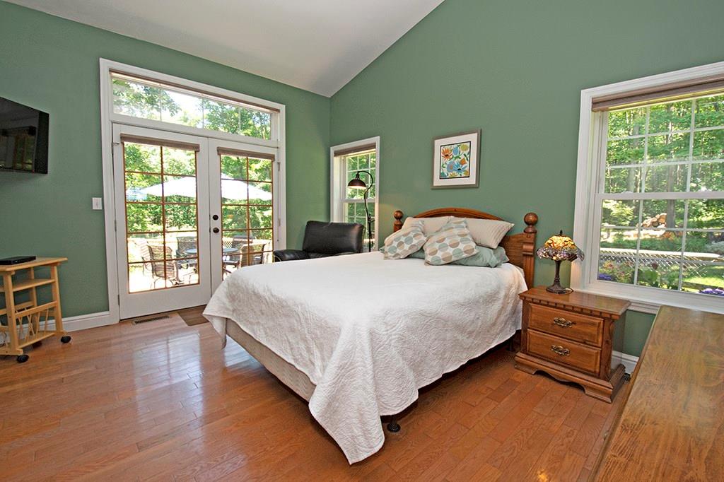 130 Lions Road Butler, PA 16001 - Photo 15 of 25 2nd bedroom has beautiful view of the garden and french door access to the side patio.