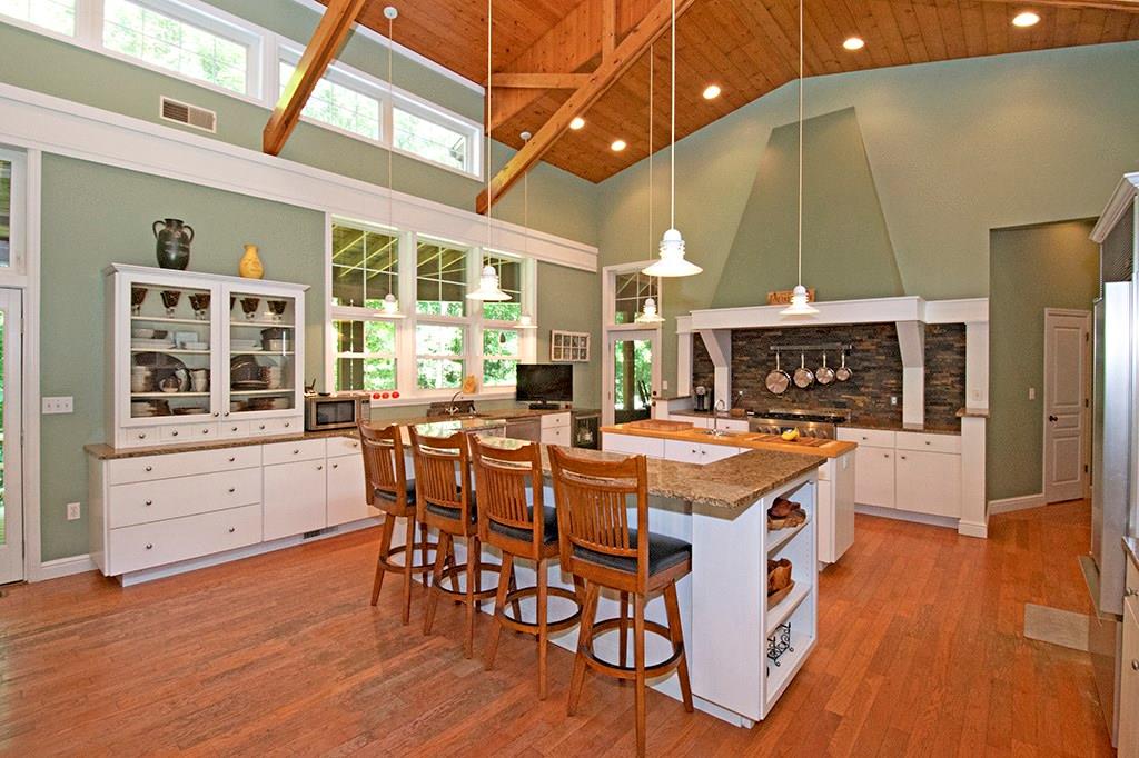 130 Lions Road Butler, PA 16001 - Photo 3 of 25 Large granite serving island with bar seating in the great room.