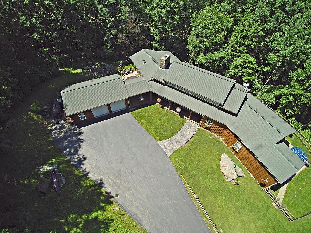 130 Lions Road Butler, PA 16001 - Photo 22 of 25 130 Lions Road, surrounded by nature with gorgeous wooded acreage providing peaceful privacy.