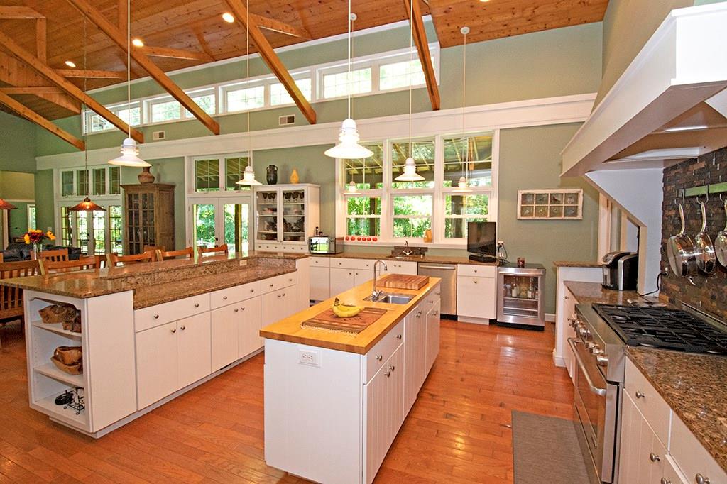 130 Lions Road Butler, PA 16001 - Photo 4 of 25 Gourmet kitchen includes second butcher block work island with convenient prep sink and task pendant lighting.