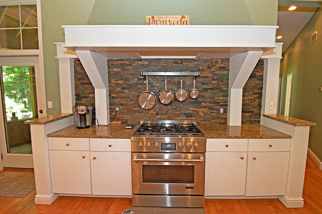 130 Lions Road Butler, PA 16001 - Photo 5 of 25 Chef's dream Jen Aire stove, ample granite covered work space, and unique stone tile back splash.